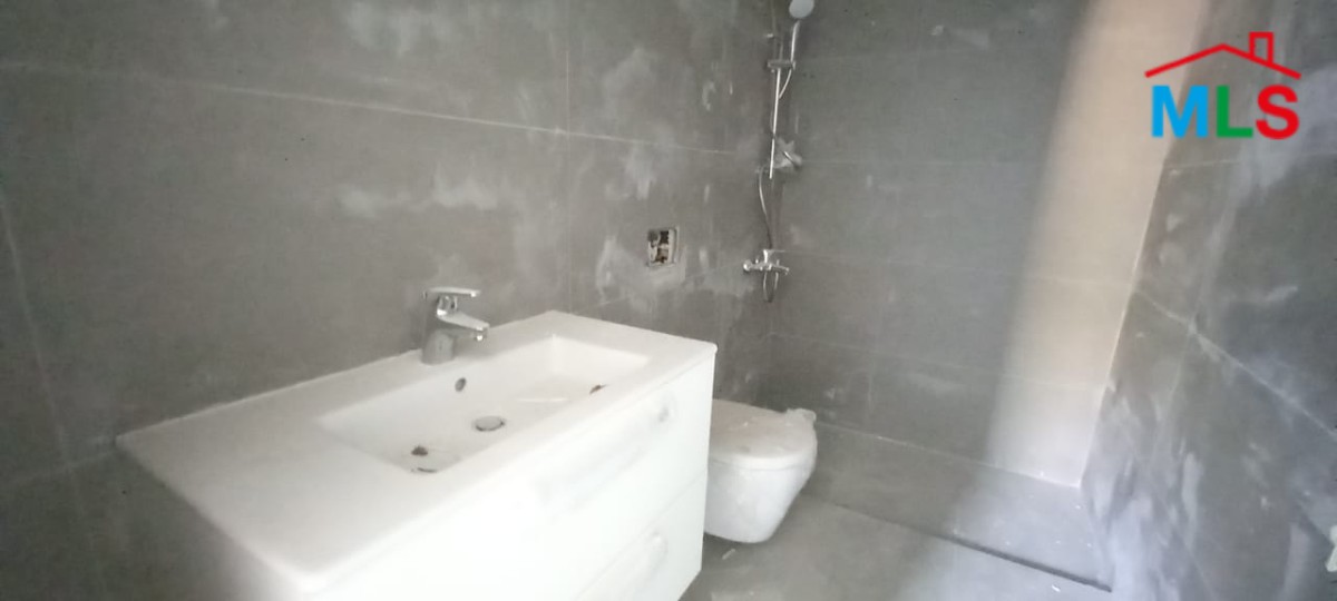 A Deluxe Apartment for Rent in Adma with Garden and Open Sea View