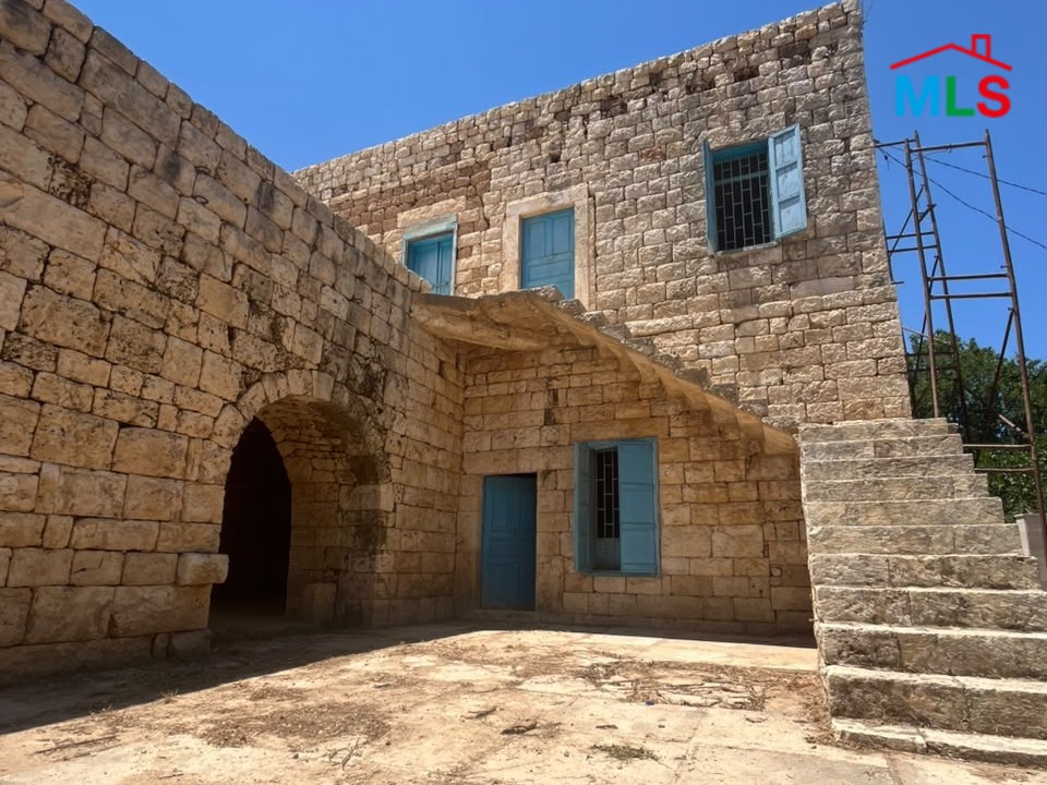 1,100 SQM Land with Traditional Stone House For Sale in Koura