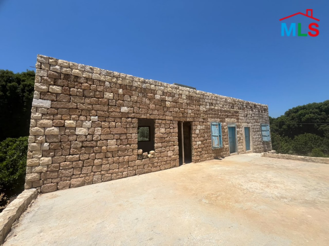 1,100 SQM Land with Traditional Stone House For Sale in Koura