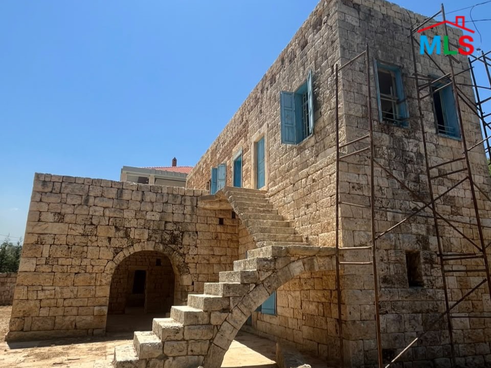 1,100 SQM Land with Traditional Stone House For Sale in Koura
