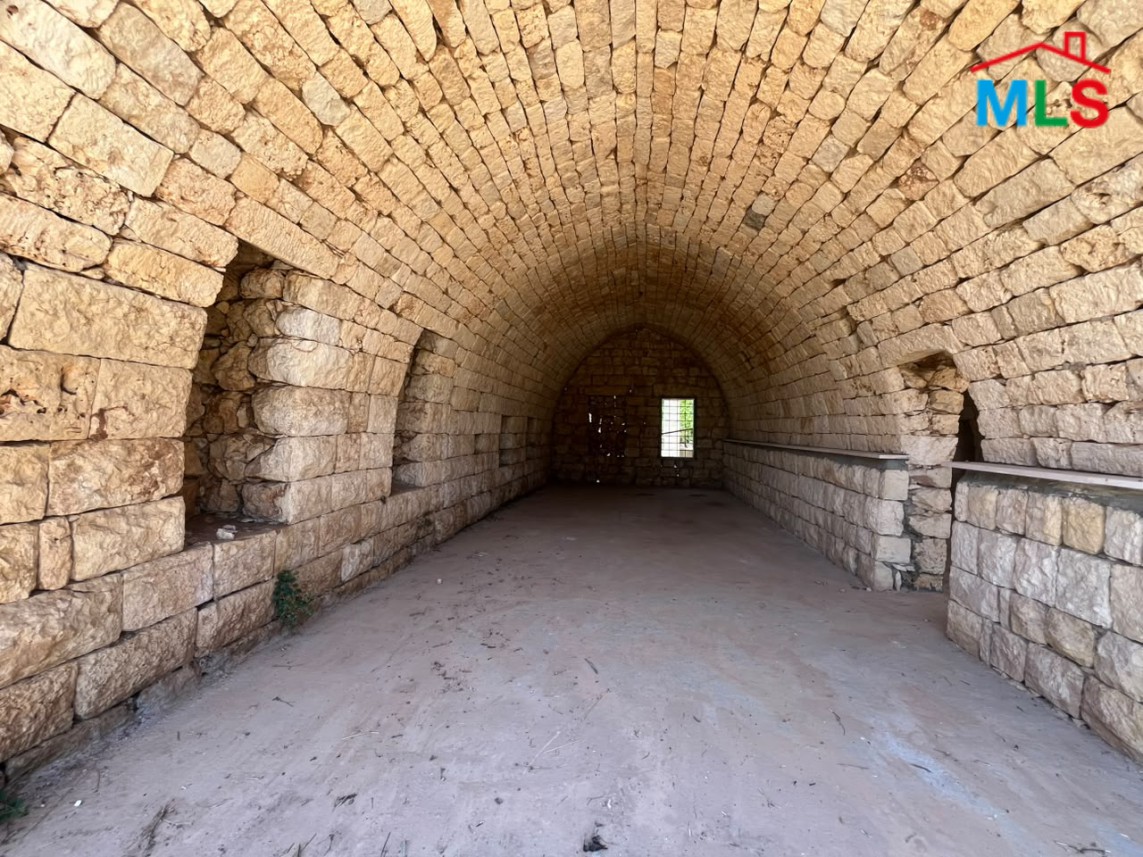 1,100 SQM Land with Traditional Stone House For Sale in Koura