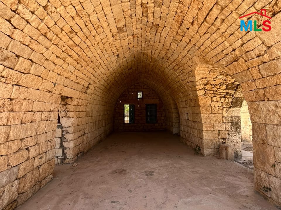 1,100 SQM Land with Traditional Stone House For Sale in Koura