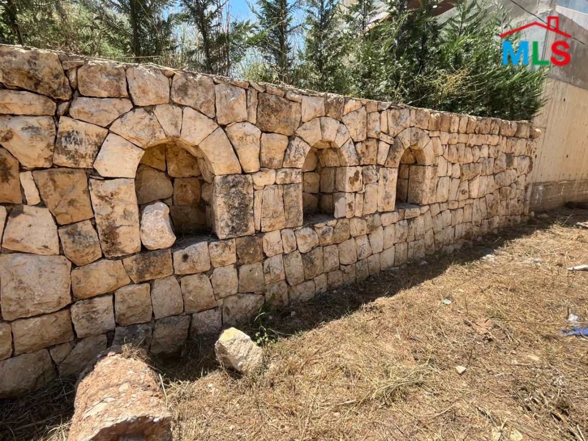 1,100 SQM Land with Traditional Stone House For Sale in Koura