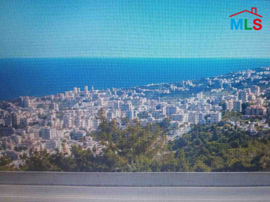 Prime Hillside Land With Panoramic View For Sale in Roumie