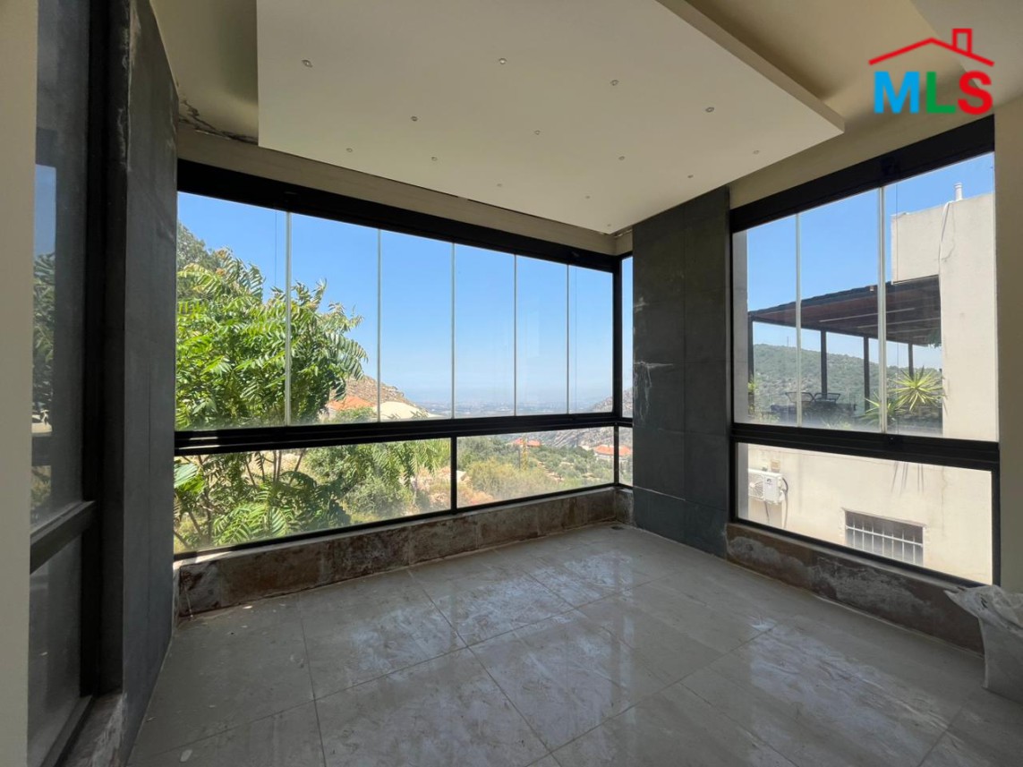 Bright Apartment with Terrace & Mountain View For Sale in Koura