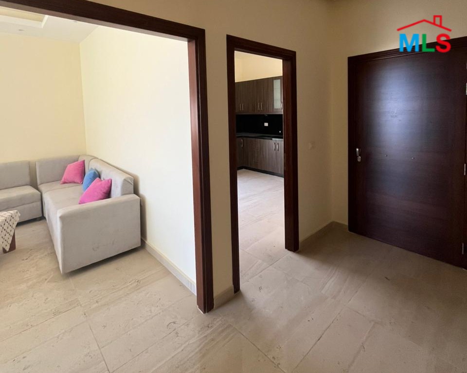 Bright Apartment with Terrace & Mountain View For Sale in Koura