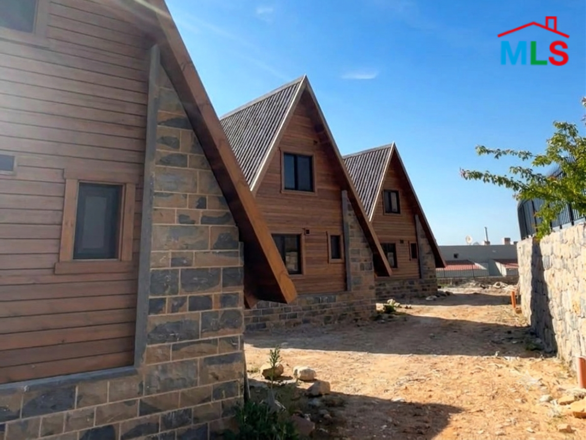 1,105 SQM Land with 3 Chalets in Prime Location For Sale In Zaarour
