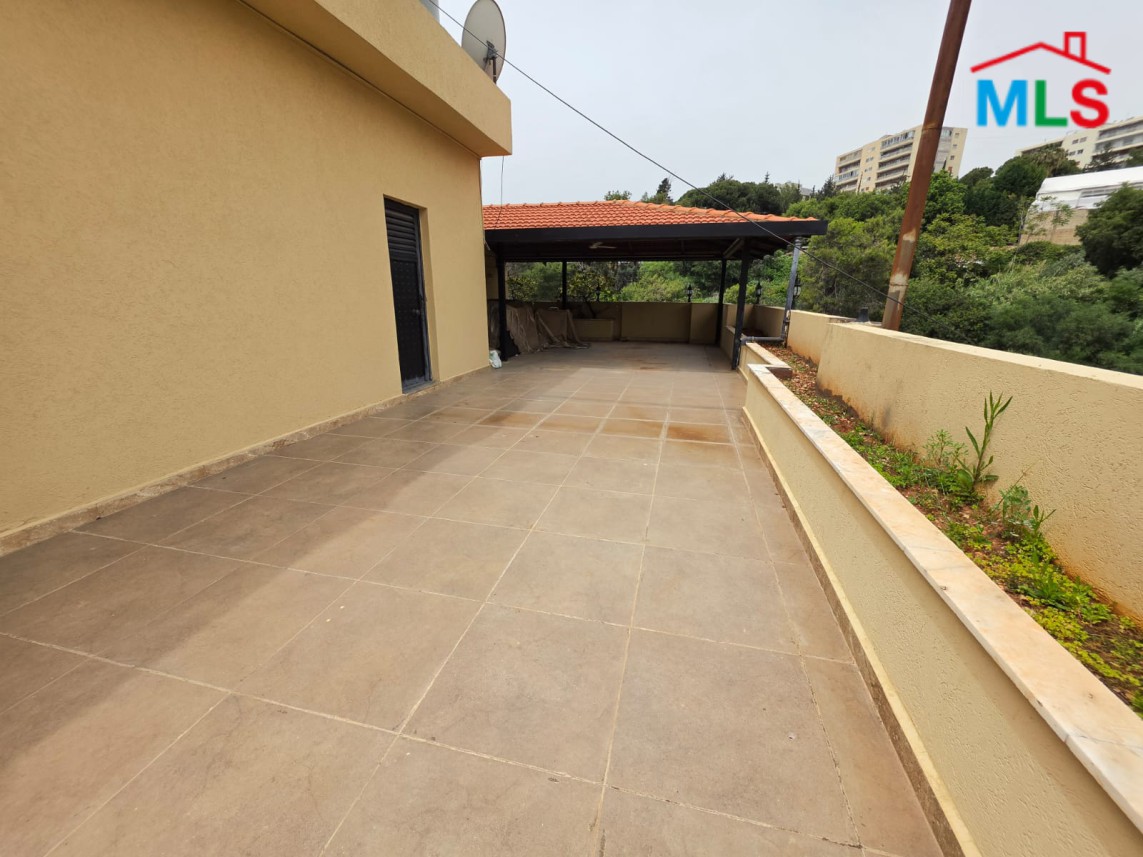 Bright 3-Bedroom Apartment with Roof Terrace For Sale in Baabda
