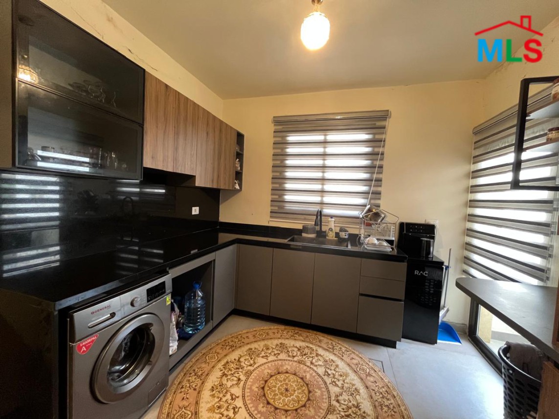 Elegant Apartment with Rooftop & Mountain View For Sale in Koura