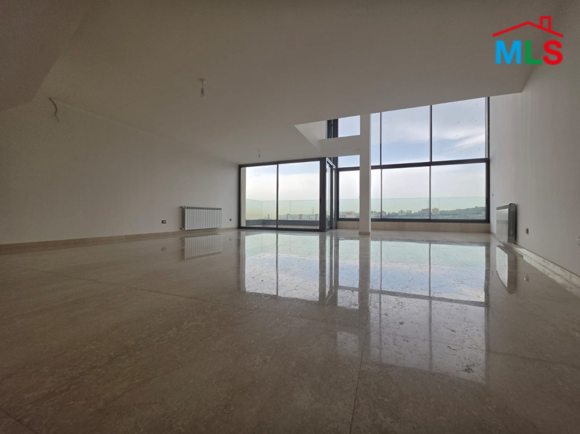 Spacious Triplex With Terrace For Sale in A High-End Building in Hazmieh