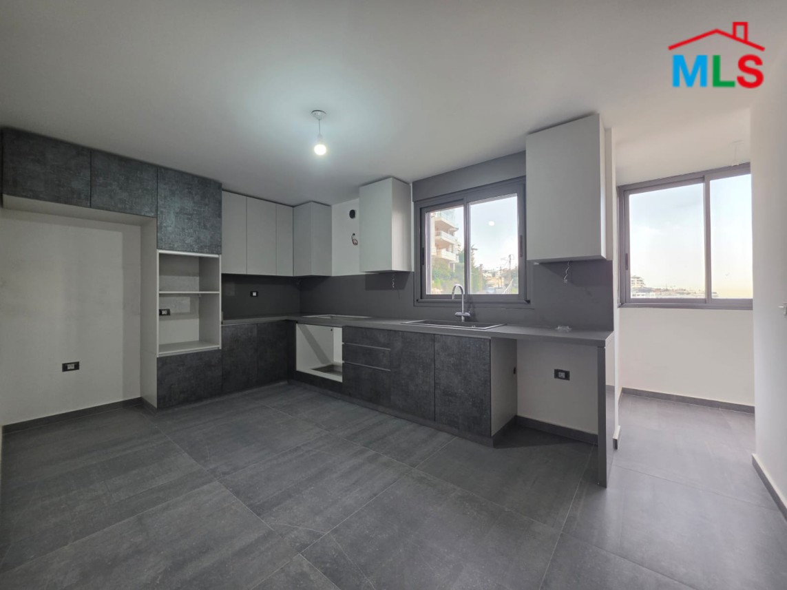 Spacious Triplex With Terrace For Sale in A High-End Building in Hazmieh