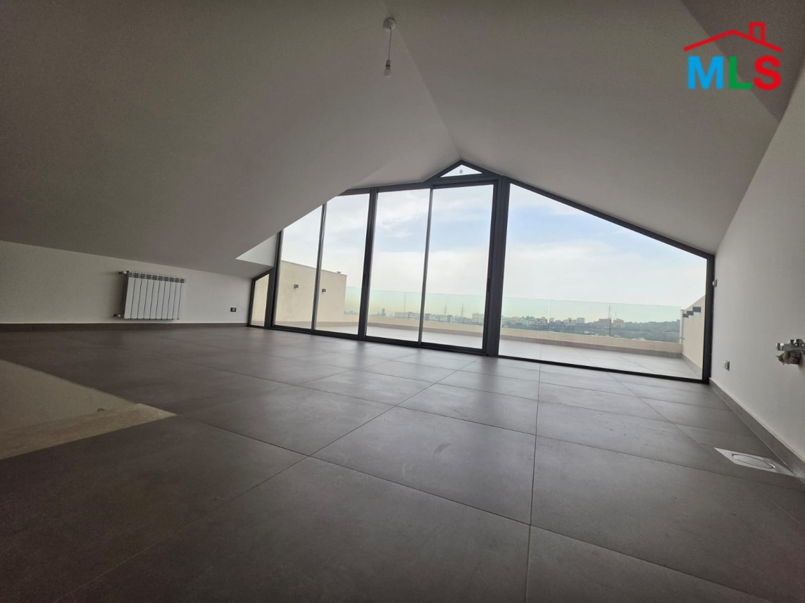 Spacious Triplex With Terrace For Sale in A High-End Building in Hazmieh