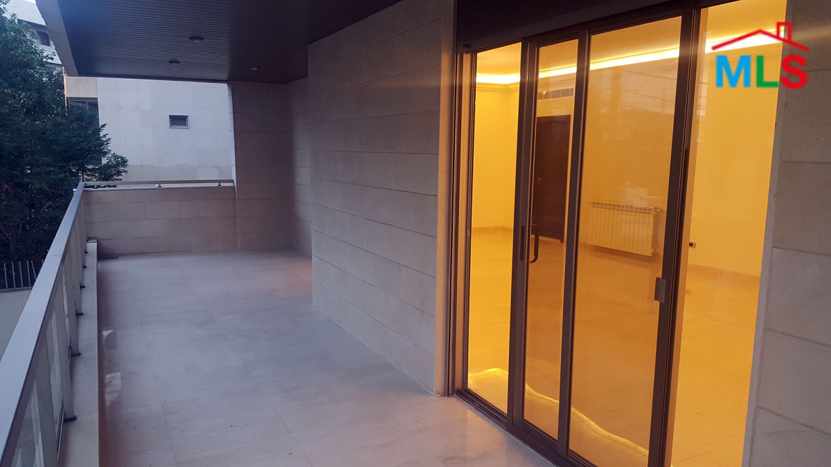 Spacious Apartment With Backyard Terrace For Sale in Mar Takla