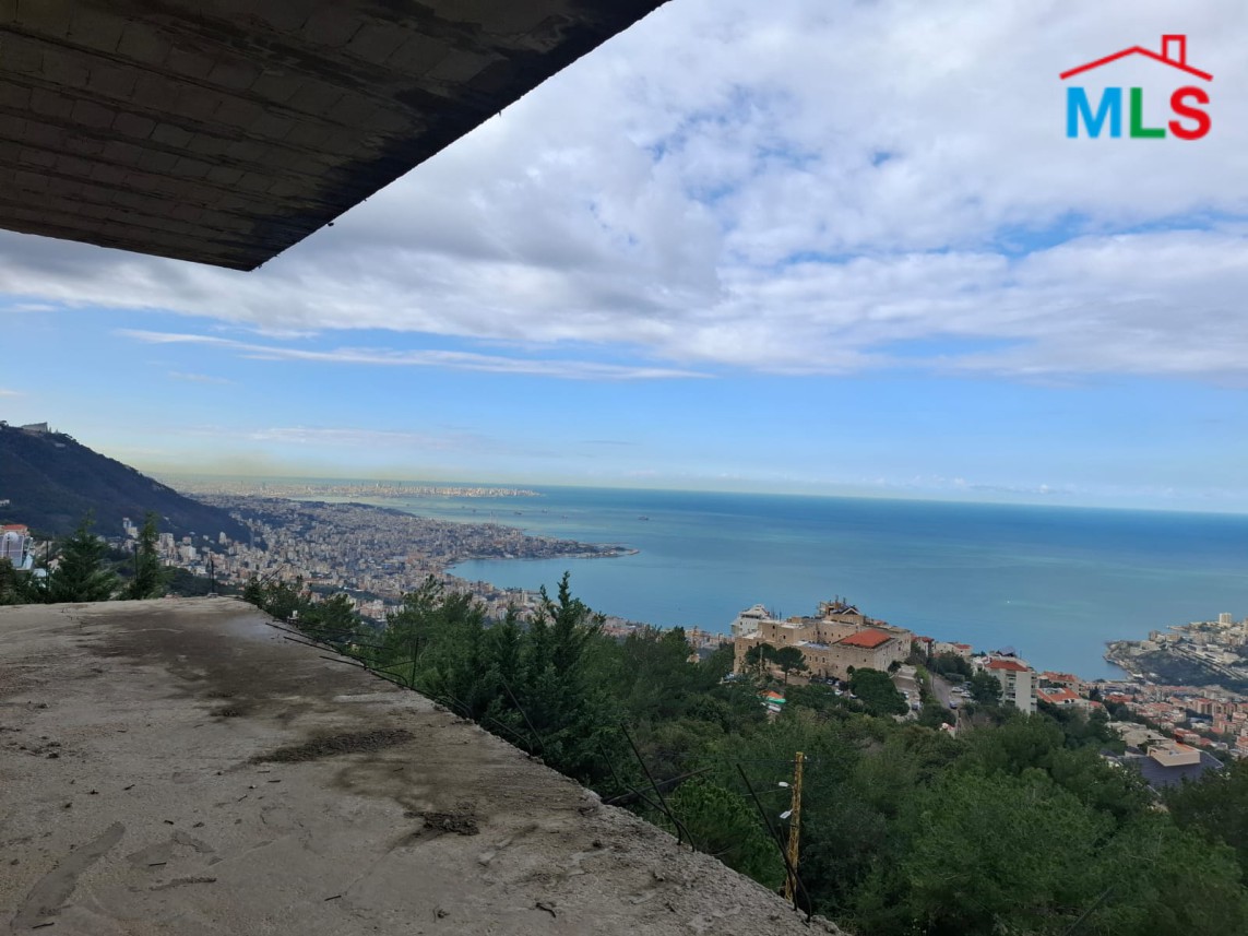 A 1,368 SQM Land With A Residential Building For Sale in Kfarhbeib