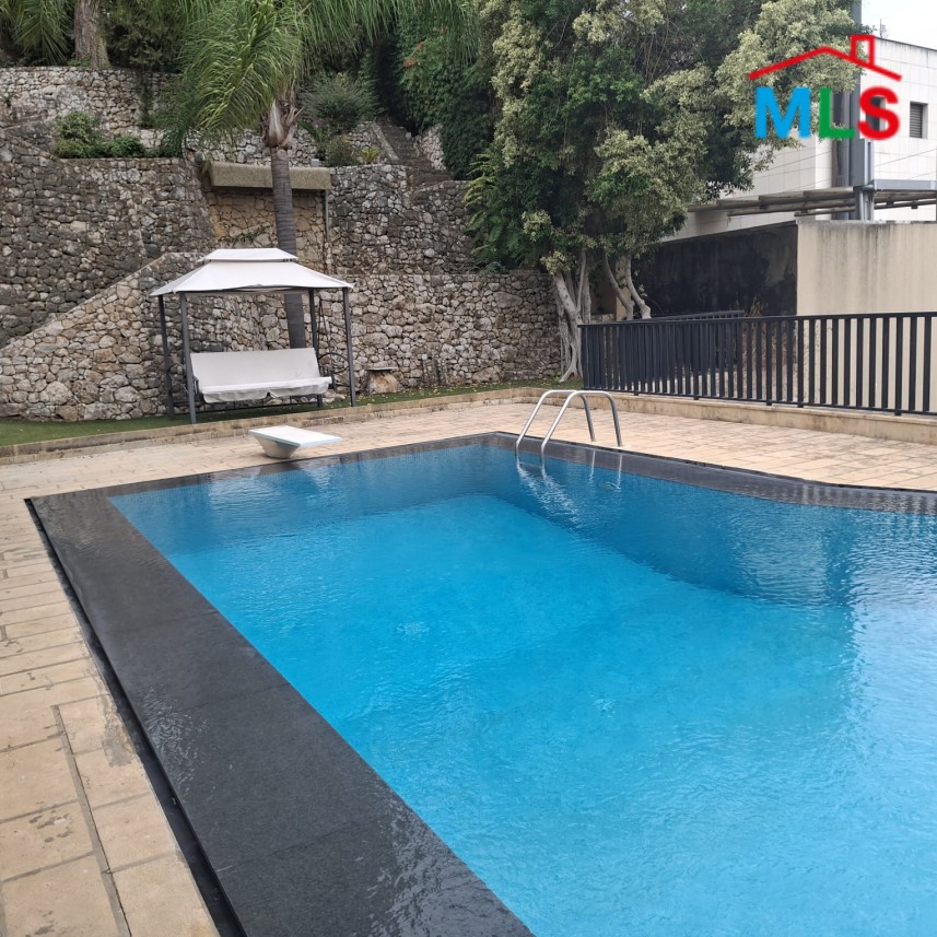 2-Level Apartment with Shared Pool and Garden For Sale in Mtayleb
