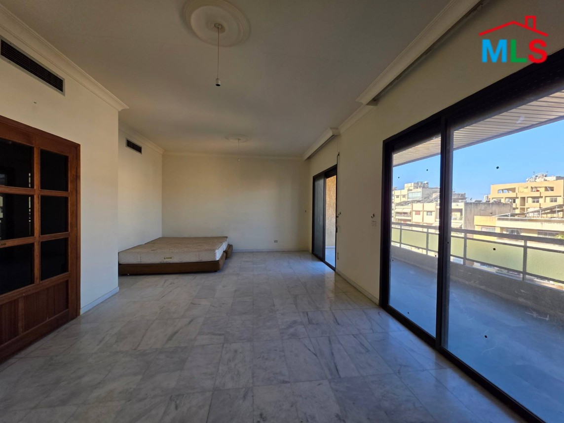 Spacious 3-Bedroom Apartment with Open City View For Sale in Horsh Tabet