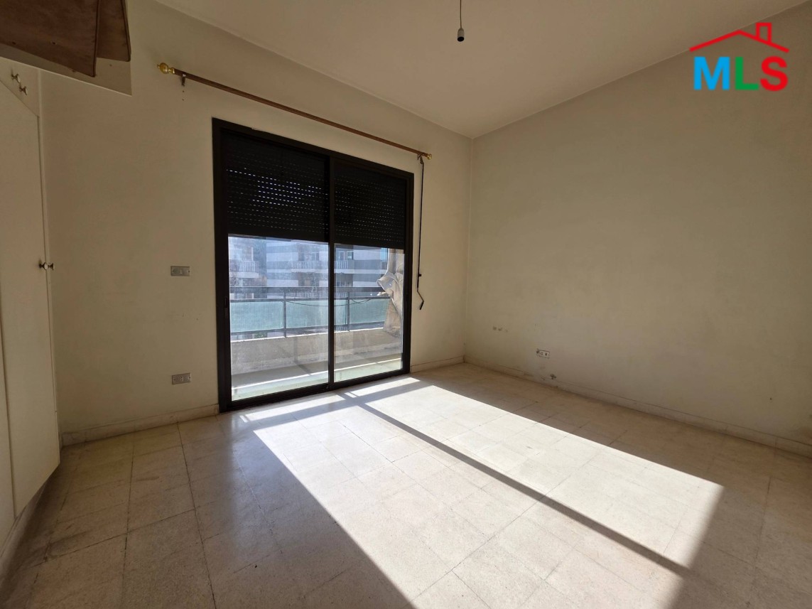 Spacious 3-Bedroom Apartment with Open City View For Sale in Horsh Tabet