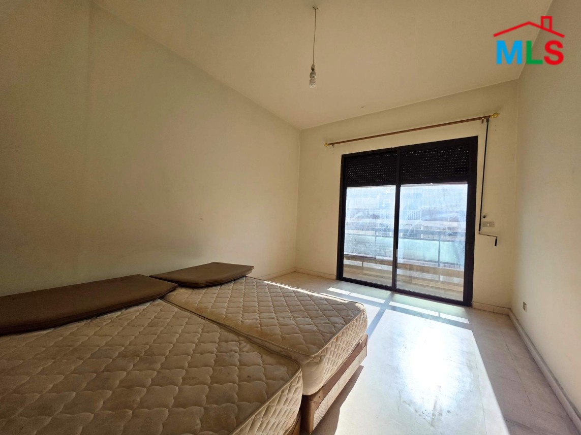 Spacious 3-Bedroom Apartment with Open City View For Sale in Horsh Tabet
