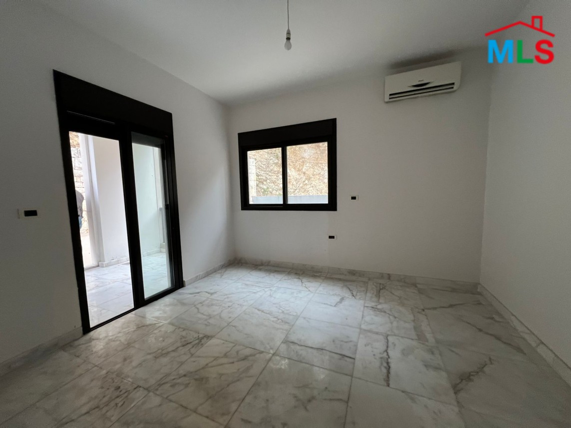 Lovely Apartment With Backyard Terrace For Sale in Kfarhbeib