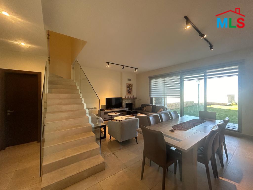 Furnished Chalet and Garden with Amazing view For Sale in Tilal Fakra