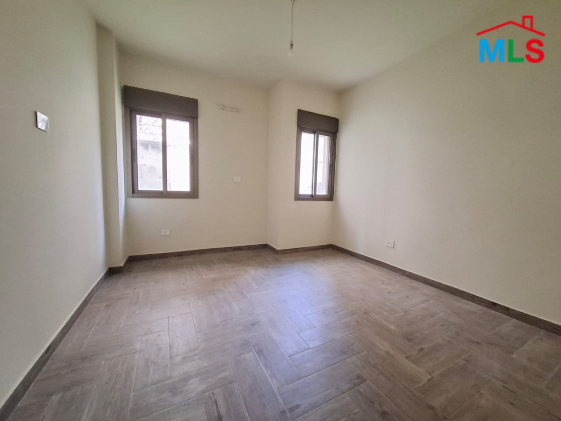 Spacious 3-Bedroom Apartment With Garden For Sale in Shayle