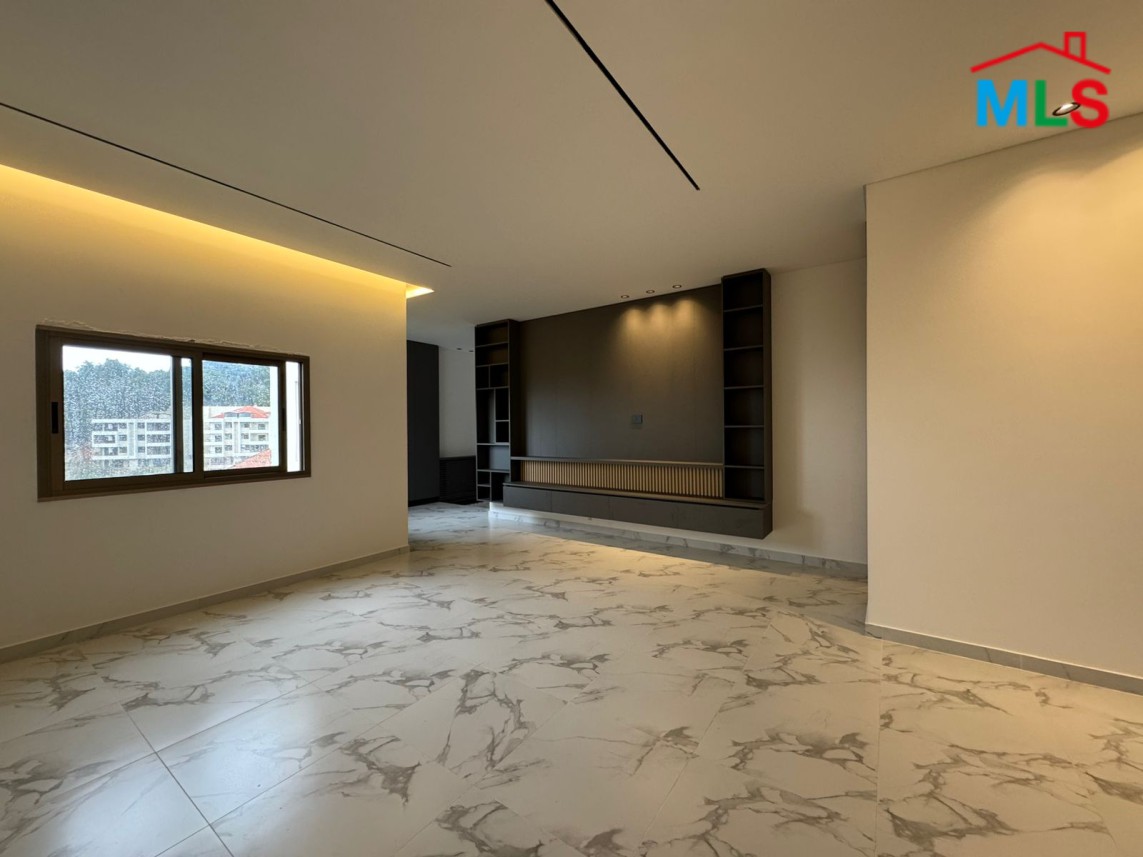 Brand New Decorated Apartment With A Large Terrace For Sale in Tilal Ain Saade