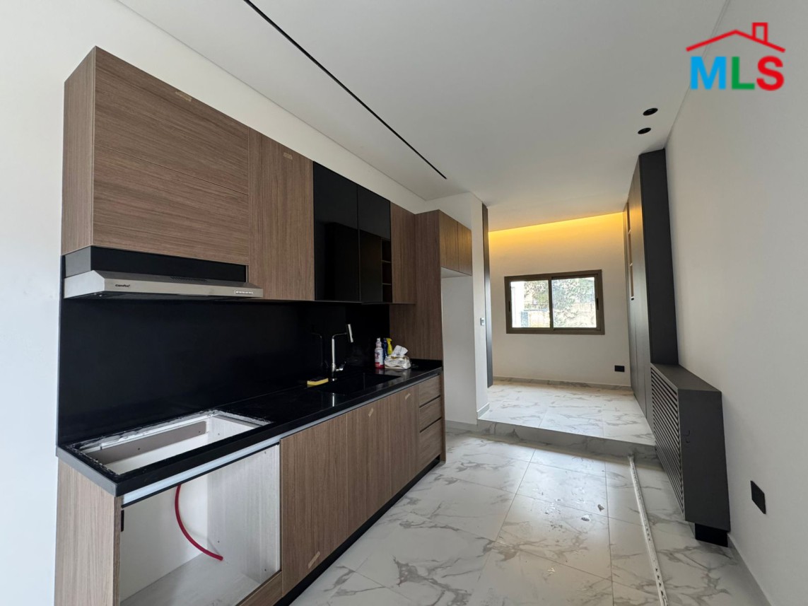 Brand New Decorated Apartment With A Large Terrace For Sale in Tilal Ain Saade