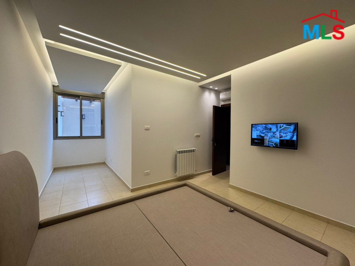 Brand New Decorated Apartment With A Large Terrace For Sale in Tilal Ain Saade