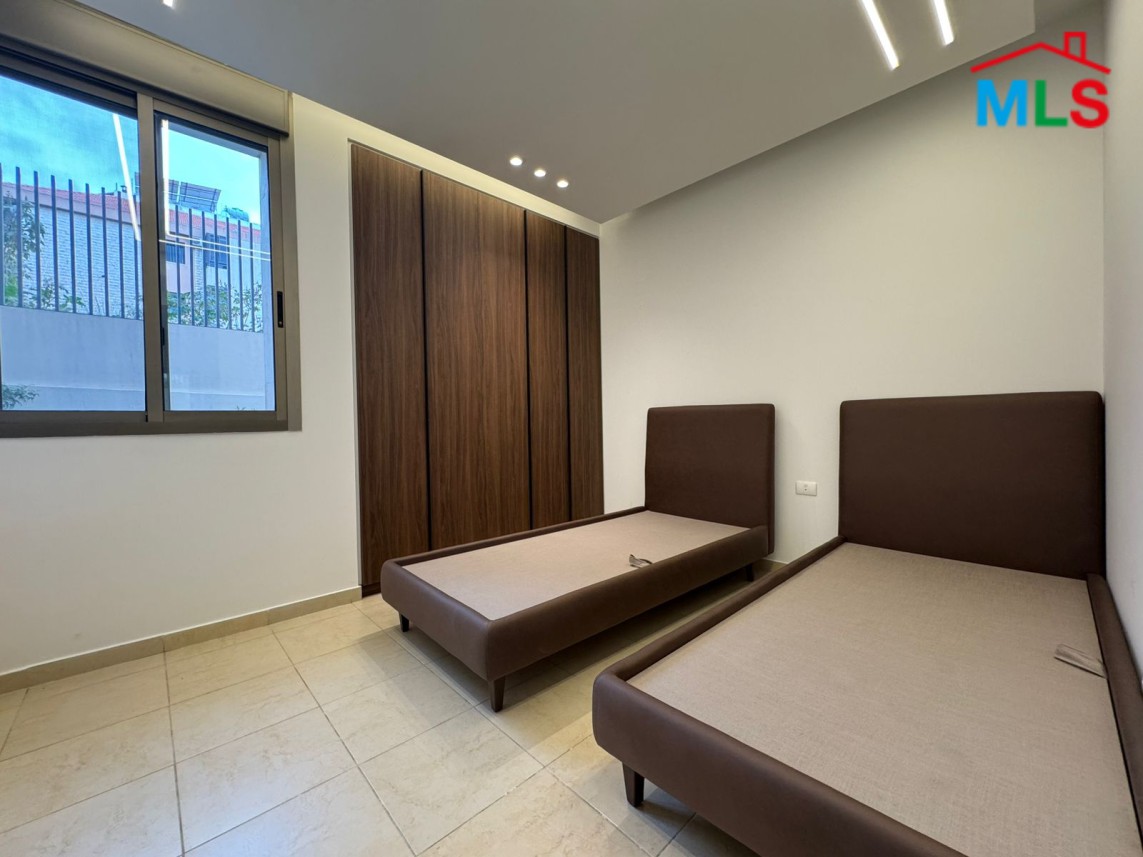 Brand New Decorated Apartment With A Large Terrace For Sale in Tilal Ain Saade
