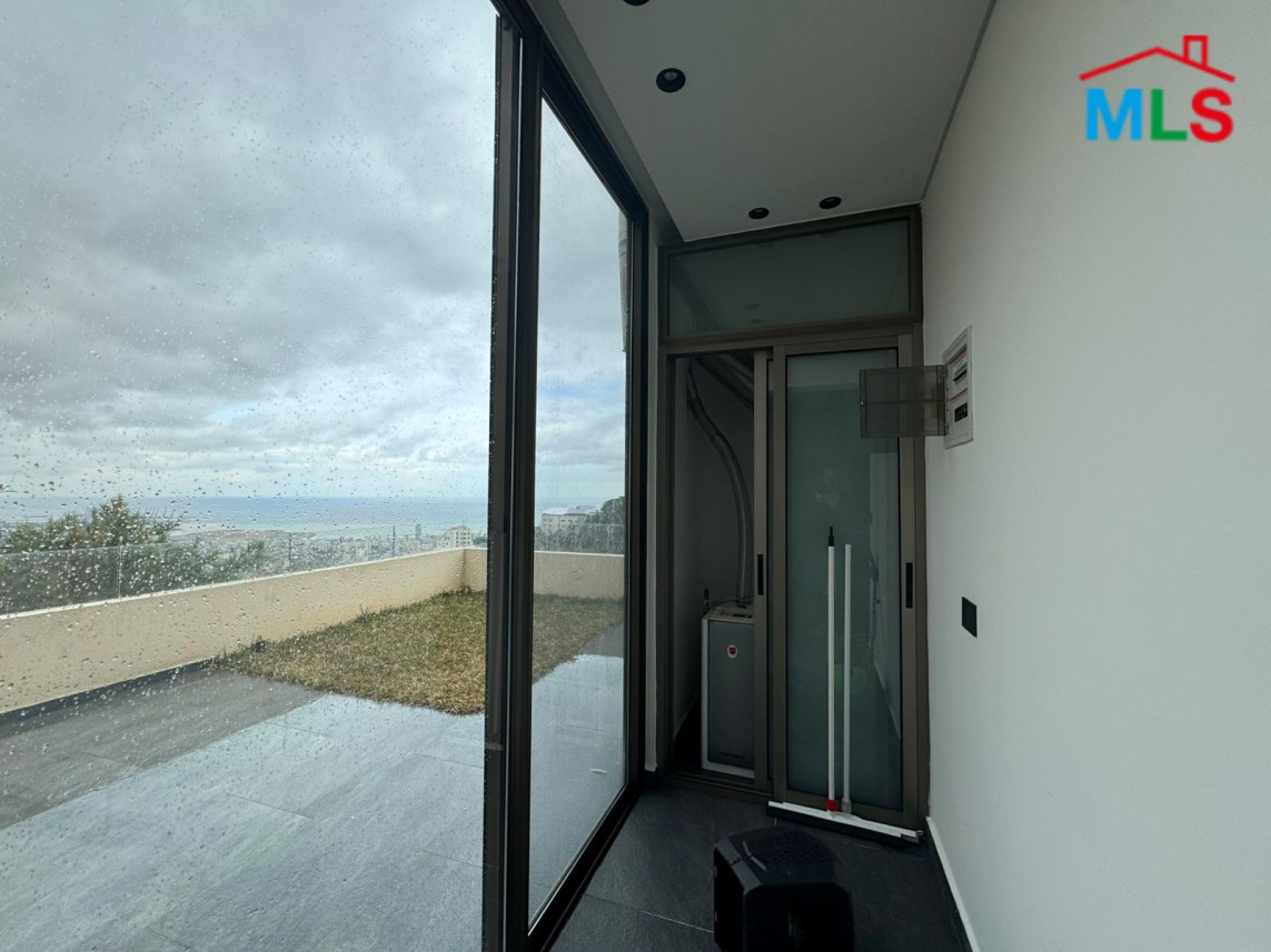 Brand New Decorated Apartment With A Large Terrace For Sale in Tilal Ain Saade