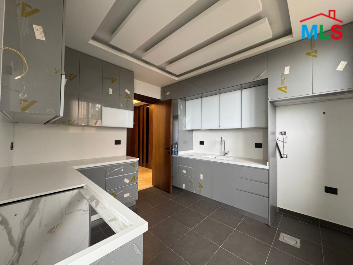 Brand New Decorated Apartment With A Large Terrace For Sale in Tilal Ain Saade