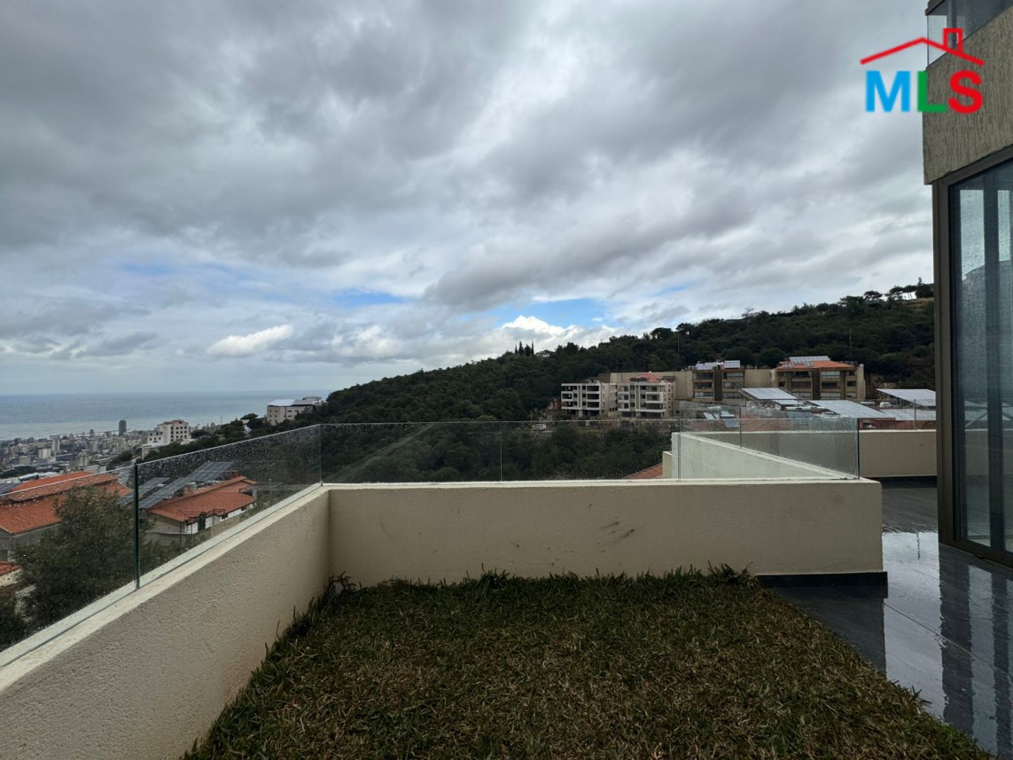 Brand New Decorated Apartment With A Large Terrace For Sale in Tilal Ain Saade