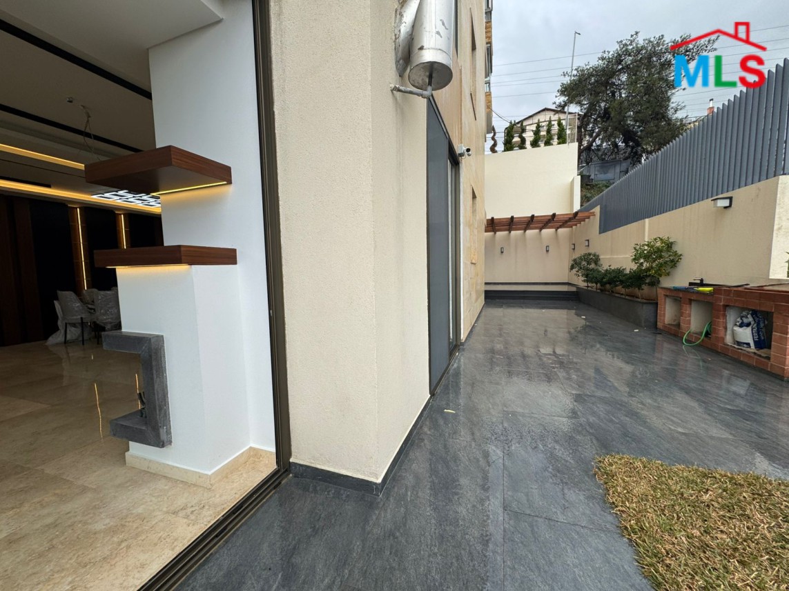 Brand New Decorated Apartment With A Large Terrace For Sale in Tilal Ain Saade