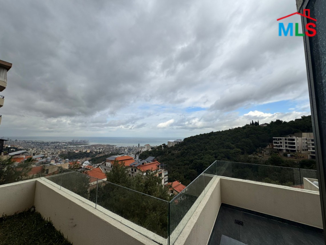 Brand New Decorated Apartment With A Large Terrace For Sale in Tilal Ain Saade