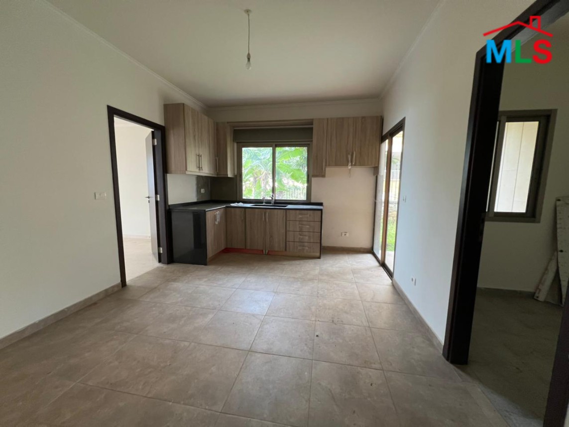 Spacious Apartment With A Big Garden For Sale in Kfarhbeib