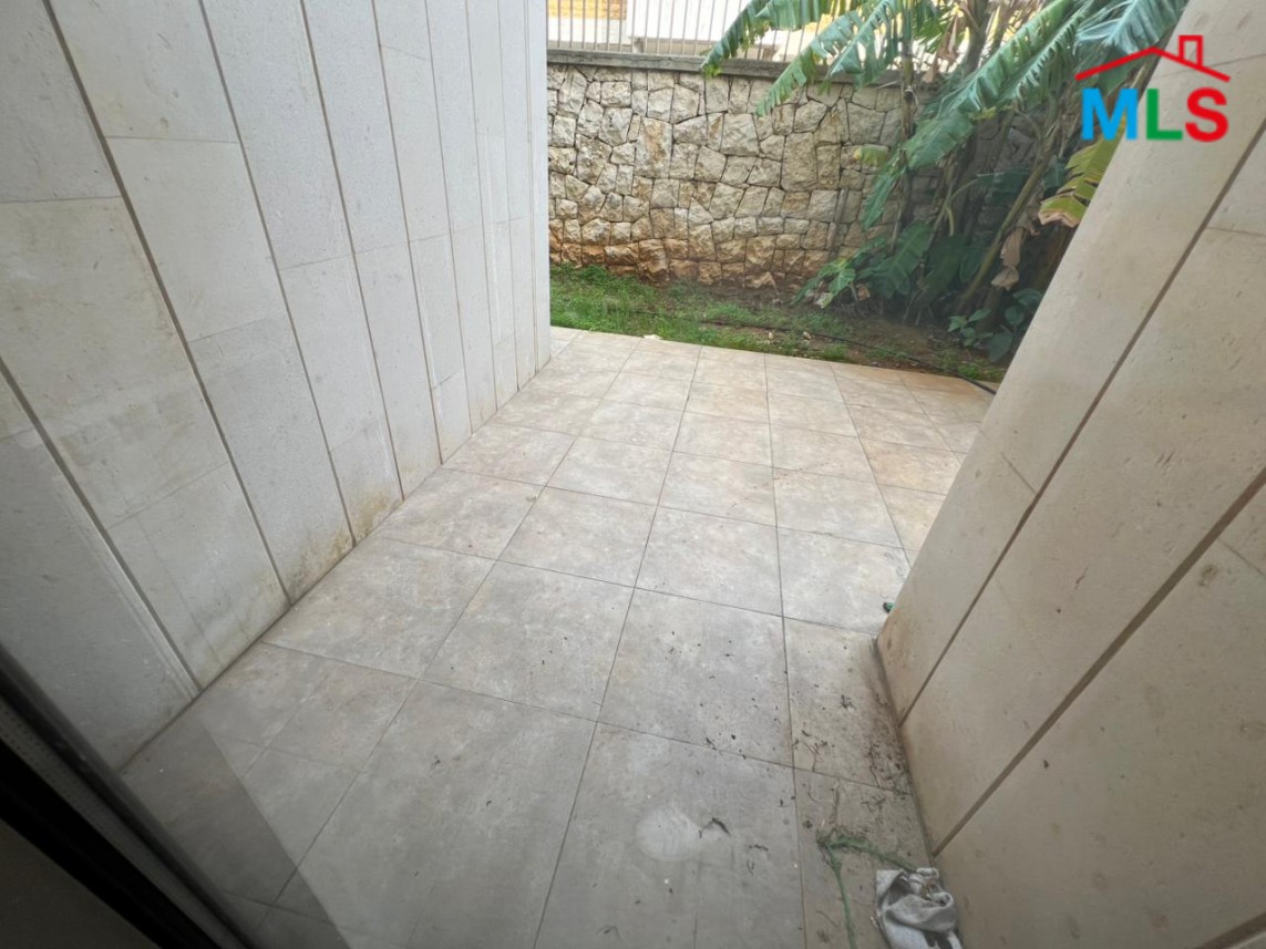 Spacious Apartment With A Big Garden For Sale in Kfarhbeib