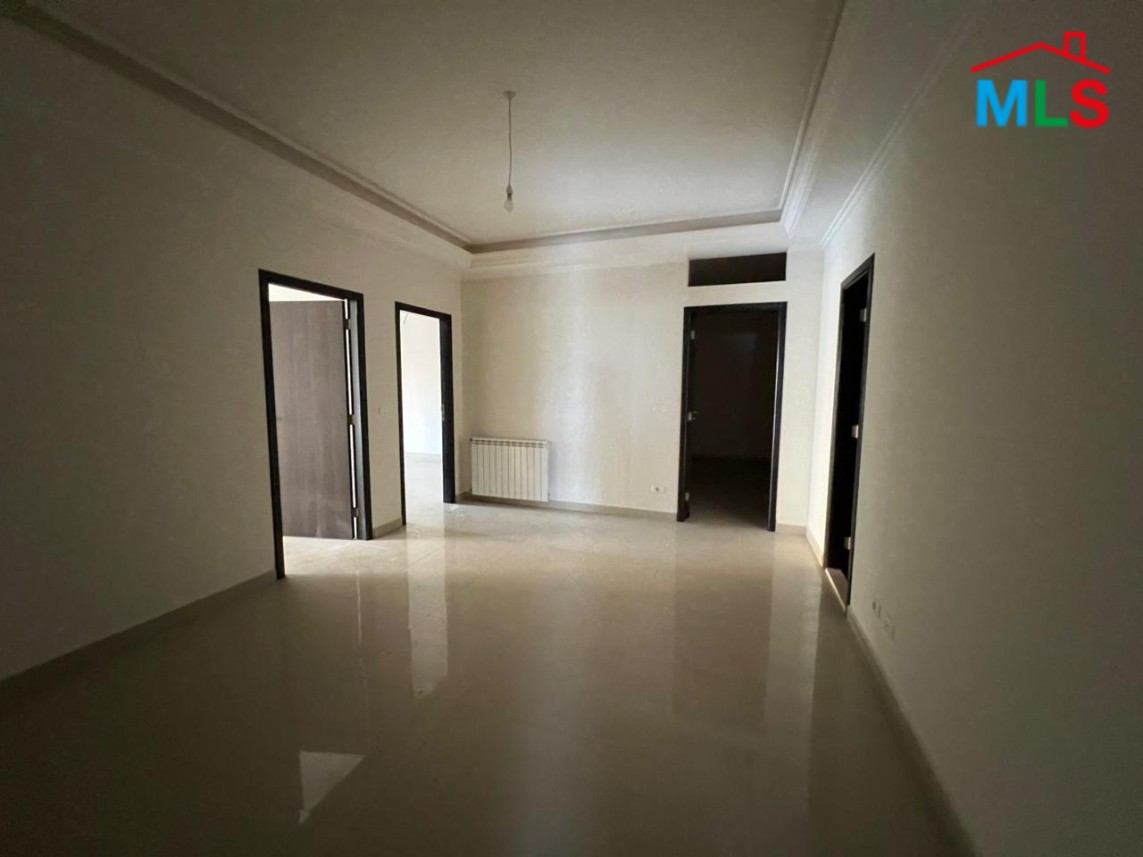 Spacious Apartment With Garden For Sale in Kfarhbeib