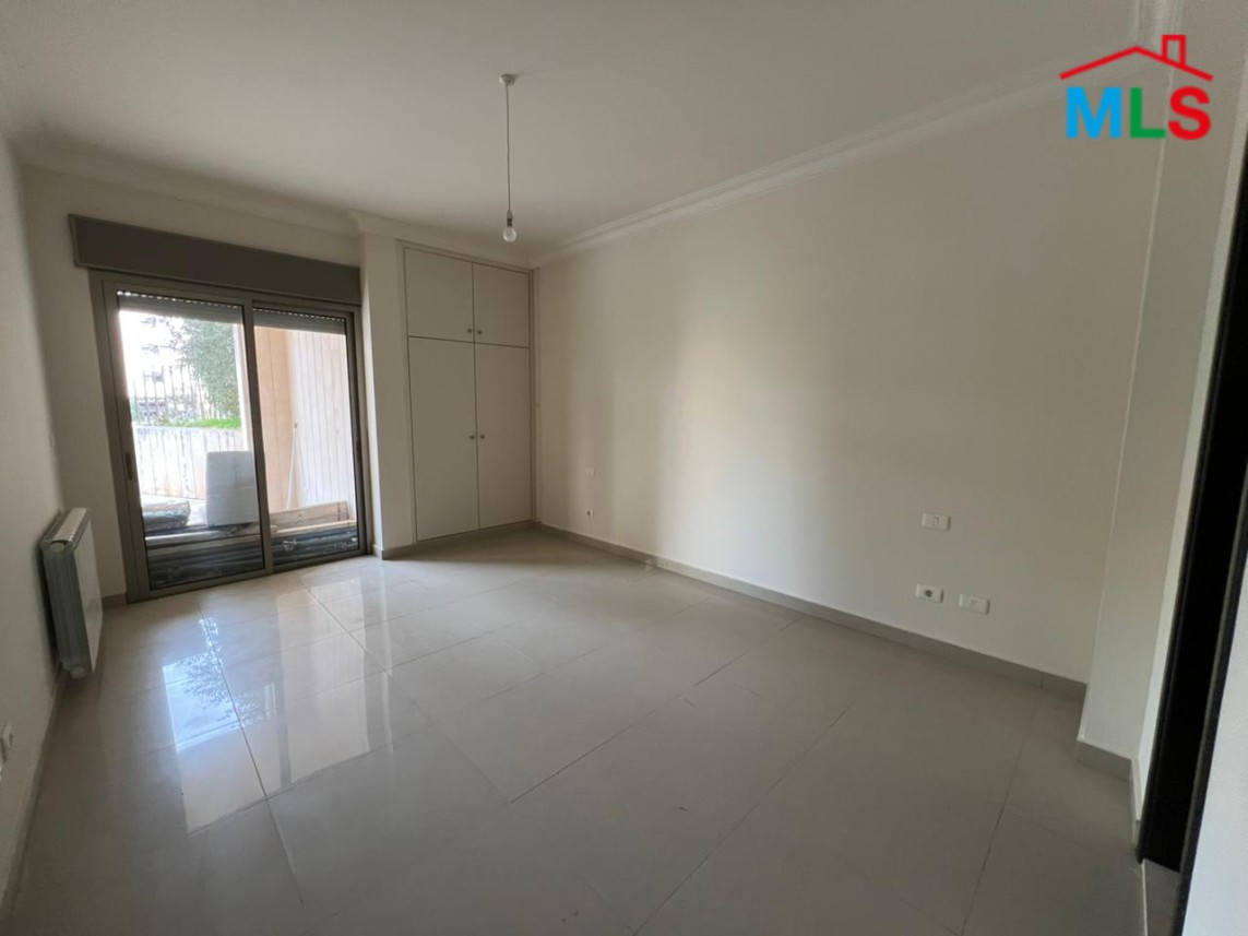 Spacious Apartment With Garden For Sale in Kfarhbeib