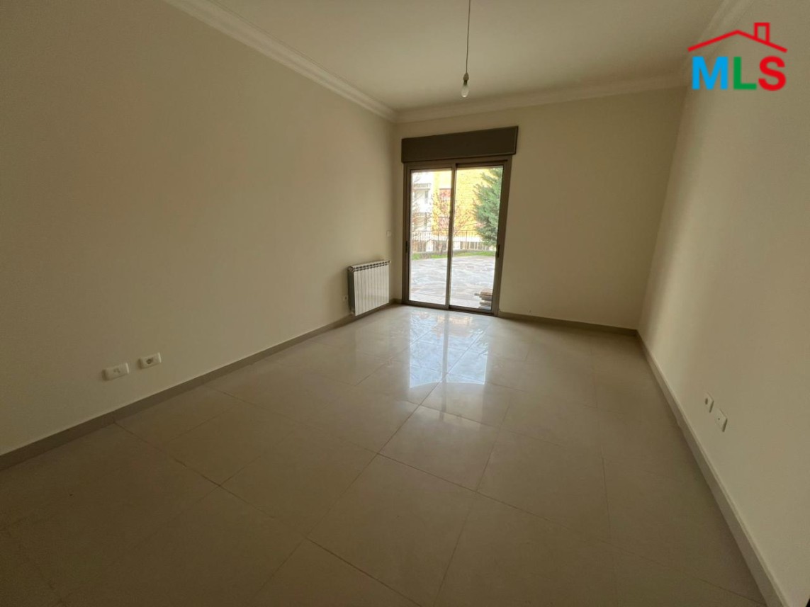 Spacious Apartment With Garden For Sale in Kfarhbeib