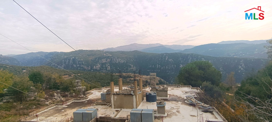 Land with Apartments & Beautiful View For Sale in Klayaat