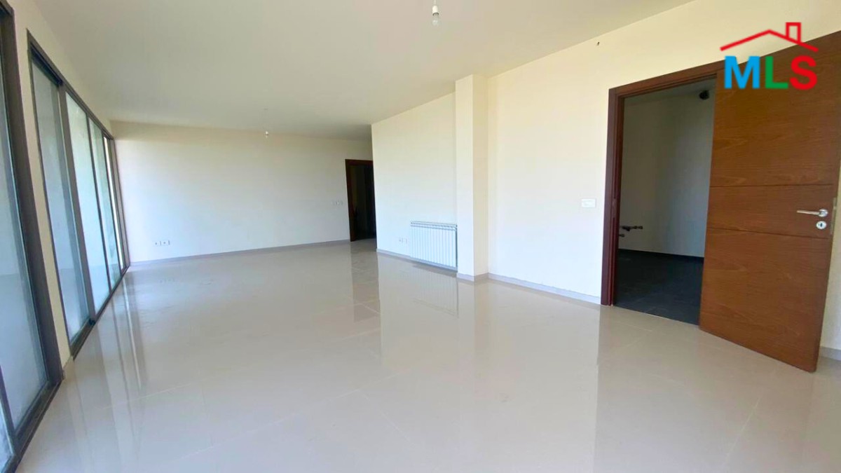 Spacious Apartment with a Beautiful View For Sale in Qornet El Hamra