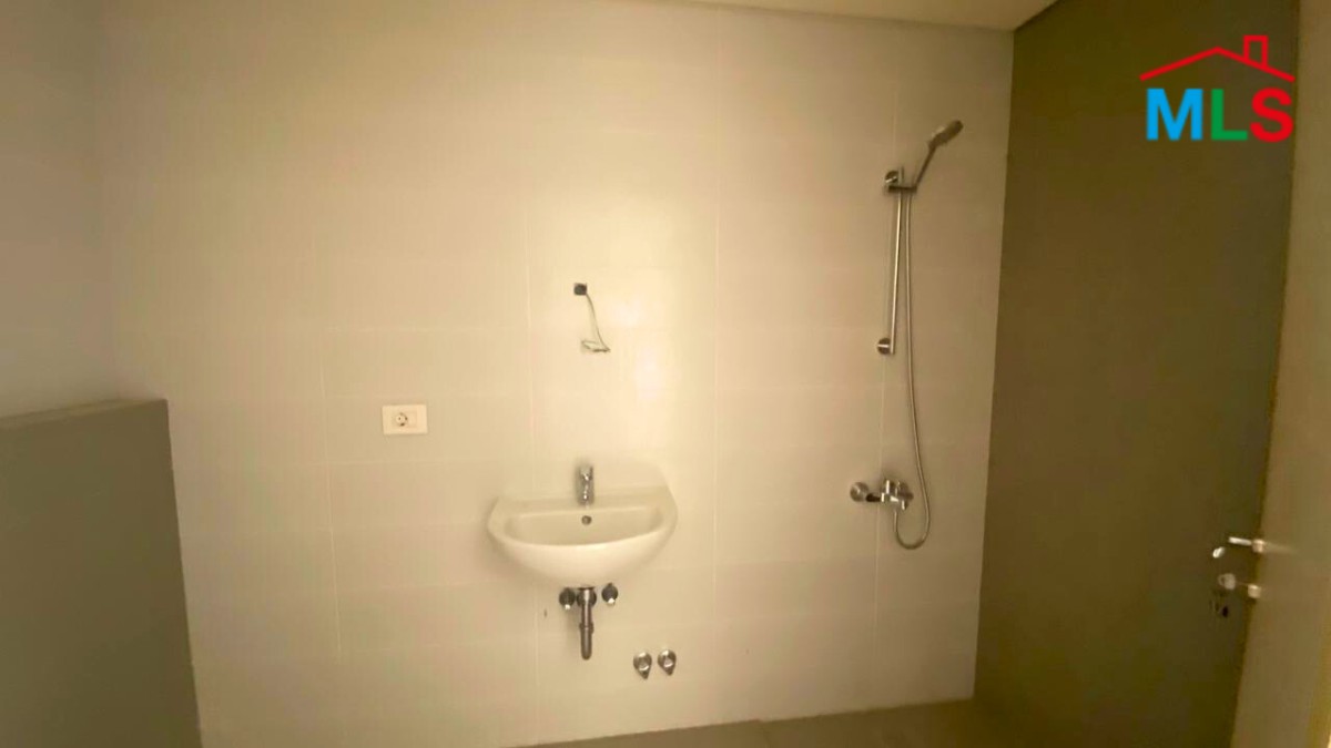 Spacious Apartment with a Beautiful View For Sale in Qornet El Hamra