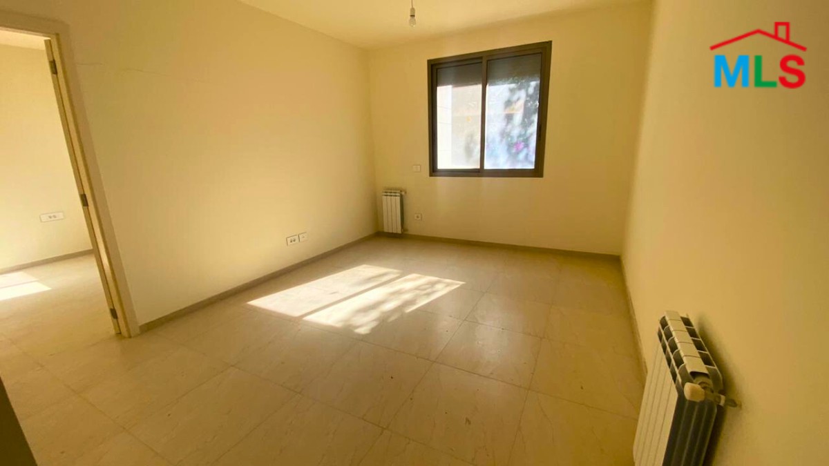 Spacious Apartment with a Beautiful View For Sale in Qornet El Hamra