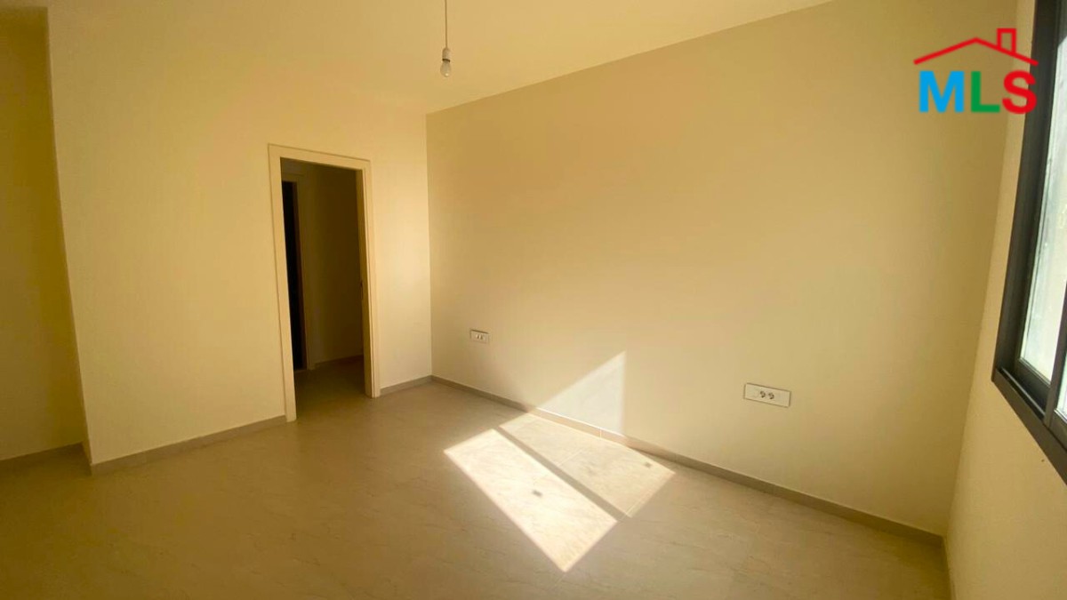 Spacious Apartment with a Beautiful View For Sale in Qornet El Hamra