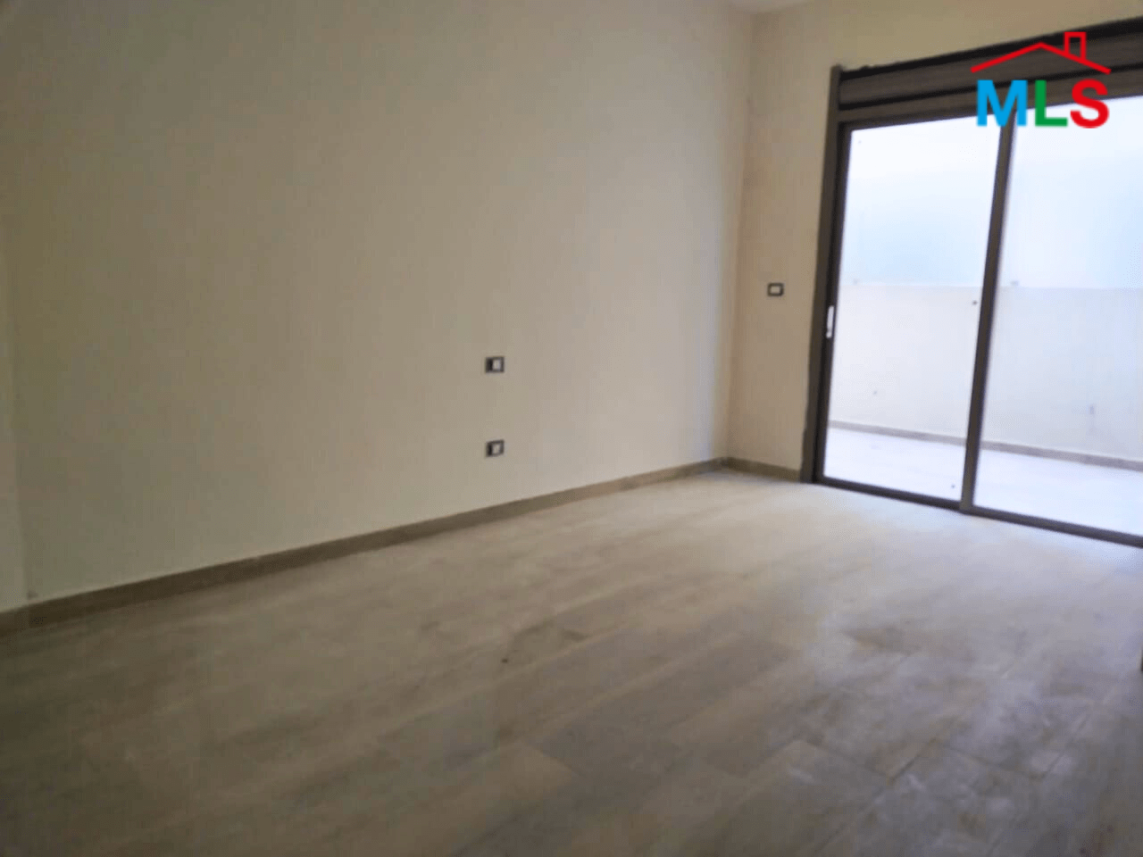 Apartment With a Garden For Sale in Ballouneh
